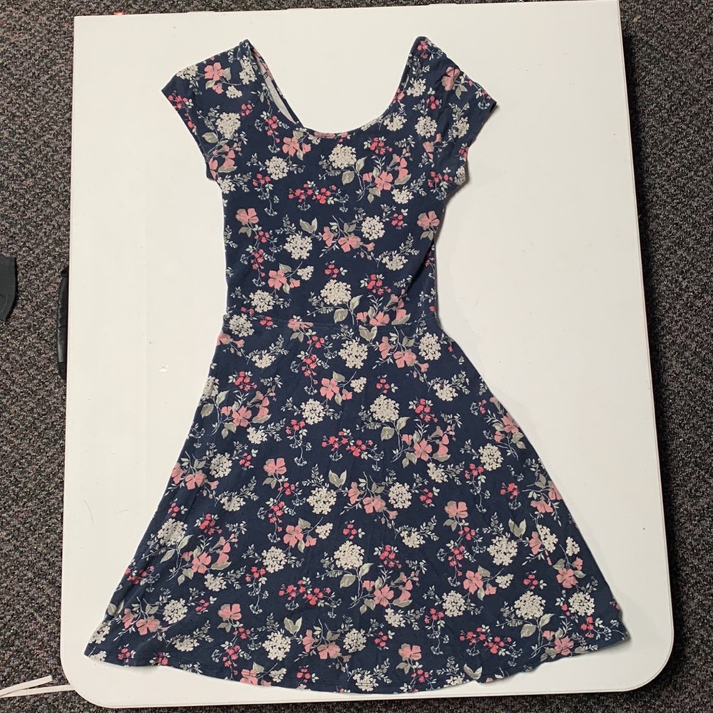 Used casual navy blue dress with a criss cross back.